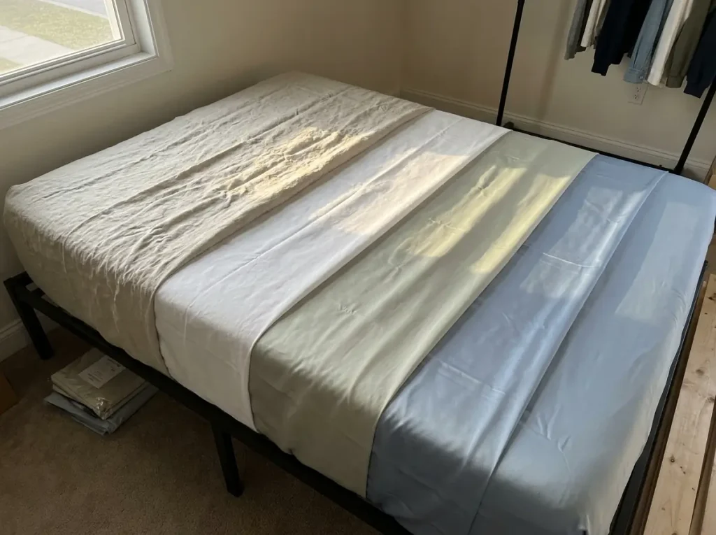Percale, linen, lyocell sateen and silk laid overlapping so each surface catches the same light