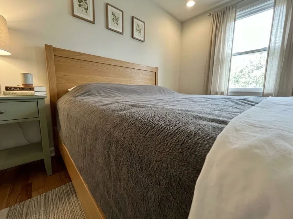 Raking lamp light across a brushed flannel sheet showing the nap lying in one direction